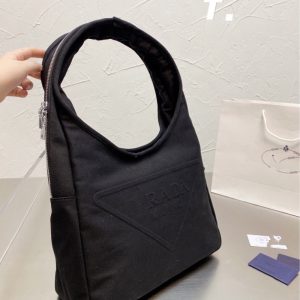 Prada Replica Bags/Hand Bags Material: Canvas Bag Type: Tote Bag Type: Tote Bag Size: 34*5*27cm Lining Material: No Lining Bag Shape: Geometric Closure Type: Exposure