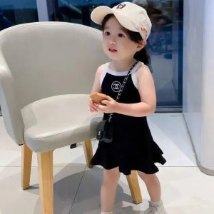 Chanel Replica Child Clothing Material: Cotton Main Fabric Composition: Cotton Main Fabric Composition: Cotton Main Fabric Content: 90 Gender: Female Pattern: Solid Color Type: Short Sleeve