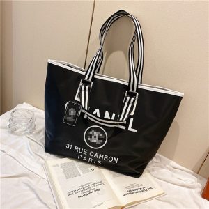Chanel Replica Bags/Hand Bags Texture: Nylon Type: Tote Type: Tote Popular Elements: Letter Closed: Zip Closure