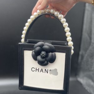 Chanel Replica Bags/Hand Bags Texture: PU Type: Small Square Bag Type: Small Square Bag Popular Elements: Floral Style: Fashion Closed: Magnetic Buckle