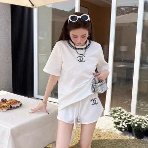 Chanel Replica Clothing Style: Temperament Ladies/Little Fragrance Popular Elements: Diamond Popular Elements: Diamond Type: Pants Suit Sleeve Length: Short Sleeve Fabric Material: Cotton/Cotton Ingredient Content: 31% (Inclusive) - 50% (Inclusive)