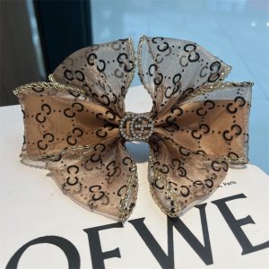 Gucci Replica Jewelry Gross Weight: 0.35kg Material: Mixed Material Material: Mixed Material Style: Women Modeling: Bow Tie Hairpin Classification: Spring Clip Style: Personality Trend