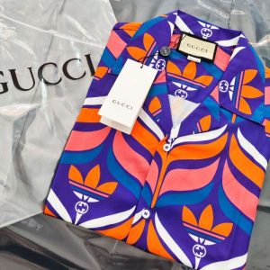 Gucci Replica Men Clothing Fabric Material: Other Version: Loose Version: Loose Collar: Pointed Collar (Regular) Sleeve Length: Short Sleeve Clothing Style Details: Printing