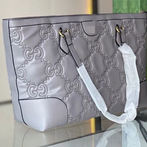 Gucci Replica Taschen/Handtaschen Textur: Rindsleder Typ: Tote Typ: Tote Beliebte Elemente: Buchstabe Stil: Mode Geschlossen: Reißverschluss