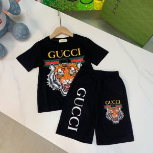 Gucci Replica Child Clothing Fabric Material: Cotton Ingredient Content: 51% (Inclusive)¡ª70% (Inclusive) Ingredient Content: 51% (Inclusive)¡ª70% (Inclusive) Gender: Universal Popular Elements: Printing Number Of Pieces: Two Piece Set Sleeve Length: Short Sleeve