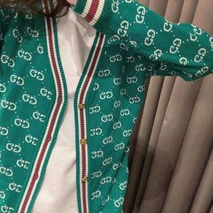 Gucci Replica Clothing Fabric Material: Wool Blend/Wool Ingredient Content: 71% (Inclusive)¡ª80% (Inclusive) Ingredient Content: 71% (Inclusive)¡ª80% (Inclusive) Style: Simple Commuting/Korean Version Popular Elements / Process: Printing Clothing Version: Loose Way Of Dressing: Cardigan