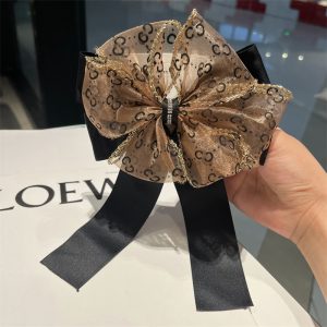 Gucci Replica Jewelry Gross Weight: 0.3kg Material: Fabric Material: Fabric Style: Women Modeling: Bow Tie Hairpin Classification: Spring Clip