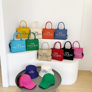 Others Replica Bags/Hand Bags Material: Canvas Bag Type: Tote Bag Type: Tote Bag Size: 25*21*11cm Lining Material: Polyester Bag Shape: Horizontal Square Closure Type: Zipper