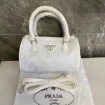 Prada Replica Bags/Hand Bags Texture: Nylon Type: Small Round Bag Type: Small Round Bag Popular Elements: Candy Style: Fashion Closed: Zip Closure Size: 20*10*12.5cm