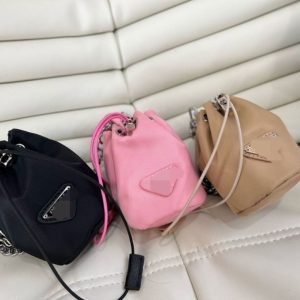 Prada Replica Bags/Hand Bags Texture: Microfiber Synthetic Leather Type: Bucket Bag Type: Bucket Bag Popular Elements: Folds Style: Small Fresh Closed: Drawstring Suitable Age: Youth (18-25 Years Old)
