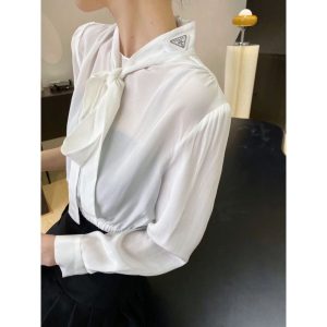 Prada Replica Clothing Style: Simple Clothing Style Details: Bow Tie Clothing Style Details: Bow Tie Sleeve Length: Long Sleeves Collar: Crew Neck Fabric Material: Chiffon/Polyester (Polyester) Ingredient Content: 100%