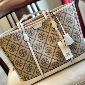 Tory Burch Bags/Hand Bags Texture: Cowhide Type: Tote Type: Tote Popular Elements: Embroidered Style: Europe And America Closed: Exposure