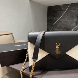YSL Replica Bags/Hand Bags Texture: Cowhide Type: Envelope Bag Type: Envelope Bag Popular Elements: Splicing Style: Fashion Closed: Magnetic Buckle Size: 27*15*5cm