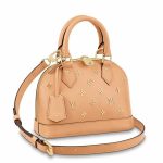 Knockoff Louis Vuitton fake LV Alma BB Bag With Metallic Monogram Pattern M58638 BLV733. Made from calfskin leather with a glamorous metallic Monogram pattern