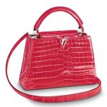 Contrefaçon Louis Vuitton LV Capucines Mini Crocodile Bag N93163 BLV807. Ce précieux sac Capucines Mini est réalisé en cuir gaufré au crocodile.