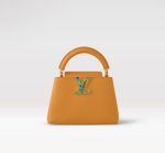 Fake Louis Vuitton Capucines Mini LV Bag Safran Imperial Yellow M21168 For sale. Make a bold statement with the Capucines Mini handbag