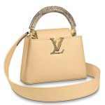 Knockoff Louis Vuitton fake LV Capucines Mini With Ayers Snakeskin Handle M55923 BLV668. The Capucines Mini handbag looks elegant For spring