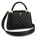 Knockoff Louis Vuitton fake LV Capucines PM Bag In Quilting Lambskin M55366 BLV852. The elegant quilting of this Capucines PM handbag subtly reprises the Monogram Flower design