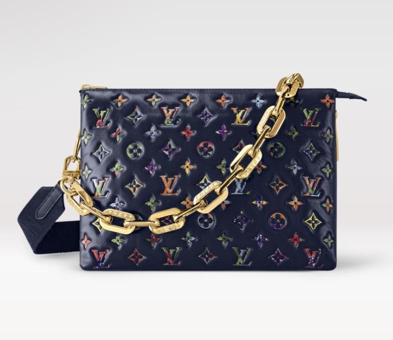 Knockoff LV fake Louis Vuitton Coussin MM LV Bag Navy Blue M21204. This Coussin MM handbag is made from puffy lambskin embossed with a surprising Monogram pattern