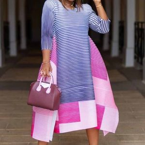 This African Loose Plus Size Women's Spring Retro Stripes Printed Casual Loose Dress Design Made Of High Quality Polyster And Spandex Material. It Is Stretchy