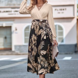 This Autumn And Winter Women's Fashion Print Patchwork v-Neck Tied Long-Sleeved Casual Dress Design Made Of High Quality Polyster And Spandex Material. It Is Stretchy