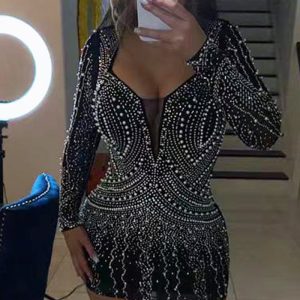 This Autumn And Winter Women's Sexy Mesh Patchwork Beaded Long Sleeve Nightclub Party Dress Design Made Of High Quality Polyster And Spandex Material