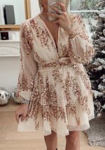 This Christmas Party Sequin Layered Casual Loose Long Sleeve Dress Design Made Of High Quality Polyster And Spandex Material. It Is Stretchy