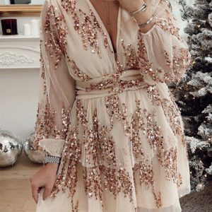 This Christmas Party Sequin Layered Casual Loose Long Sleeve Dress Design Made Of High Quality Polyster And Spandex Material. It Is Stretchy