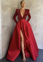 This Feminine Long-Sleeved Sequin v-Neck Swing Sequin Slit Long Evening Dress Design Made Of Good Quality Polyster And Spandex Material