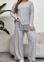 This Irregular Fringed Long-Sleeved Top And Loose Wide-Leg Pants Suit Design And Made Of Comfortable And Elastic Fabric. Wholesale Plus Size Two Piece Sets Is a Must-Have Item For Curvy Ladies. Two Piece Sets Can Either Be Worn Together Or Individually