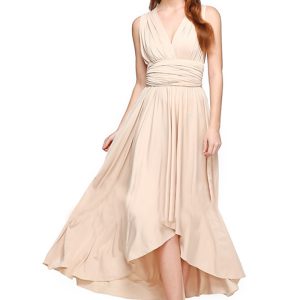 Cette robe longue sexy croisée, courte sur le devant et longue dans le dos, est fabriquée en polyester et en élasthanne de haute qualité. Elle est extensible.