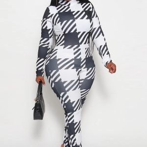 This Plus Size Women Printed Long Sleeve Casual Bell Bottom Slit Jumpsuit Design Made Of High Quality Polyster And Spandex Material. It Is Stretchy