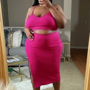 This Plus Size Women Solid Top And Slit Sexy Skirt Two-Piece Set Design And Made Of Comfortable And Elastic Fabric. Wholesale Plus Size Two Piece Sets Is a Must-Have Item For Curvy Ladies. Two Piece Sets Can Either Be Worn Together Or Individually