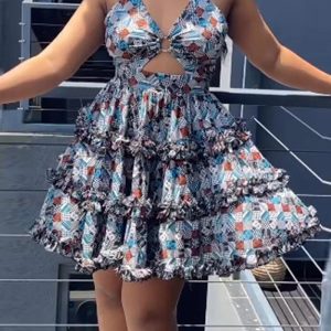 This Sexy Fit Print Ruffle Edge Stretch Cross Halter Cutout Cascading Ruffles Dress Design Made Of High Quality Polyster And Spandex Material. It Is Stretchy