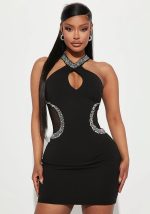 This Summer Women's Sexy Tight Fitting Cutout Beaded Halter Neck Dress Design Made Of High Quality Polyster And Spandex Material