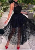 This Women Black Polka Dot Backless Bohemian Halter Neck Dress Design Made Of High Quality Polyster And Spandex Material. It Is Stretchy