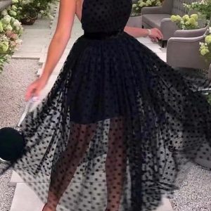 This Women Black Polka Dot Backless Bohemian Halter Neck Dress Design Made Of High Quality Polyster And Spandex Material. It Is Stretchy