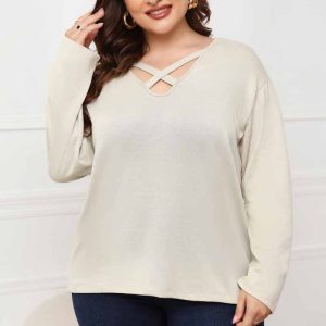 This Women Beige V-neck Casual V-neck Full Sleeves Lace Up Regular Plus Size Tops made of comfortable and elastic fabric. It is wholesale sexy plus size tops for women. With the gradual rise of feminist awareness