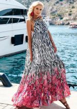 This Women Printed Halter Sleeveless Maxi Dresses design made of high quality polyster and spandex material