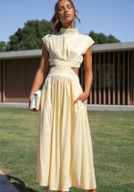 This Women Summer Stand Collar Macaron Cut Out Maxi Dress Design Made Of High Quality Polyster And Spandex Material