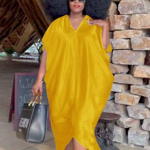 This Women Yellow Modest V-neck Half Sleeves Solid Maxi Loose Plus Size Dresses made of soft and elastic fabric. Global Lover wholesale plus size dresses and hope curvy ladies find here a warm and exciting place to shop affordable curvy dresses online - plus size casual