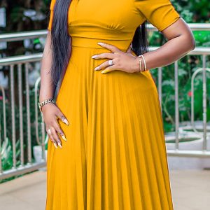 This Women Yellow O-Neck Short Sleeves Solid Midi Pleated Plus Size Dresses made of soft and elastic fabric. Global Lover wholesale plus size dresses and hope curvy ladies find here a warm and exciting place to shop affordable curvy dresses online - plus size casual