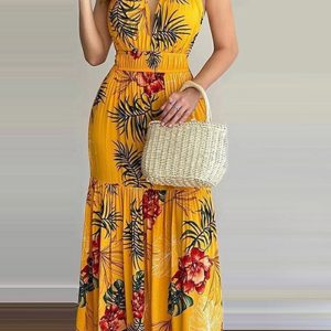 Questo donne giallo Halter senza maniche Backless Maxi Dresses design fatto di polyster di alta qualità e materiale spandex