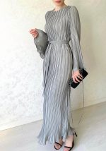 This Women's Spring Autumn Fashionable Long Dress Casual Solid Color Round Neck Bell Bottom Sleeve Pleated Dress Design Made Of High Quality Polyster And Spandex Material