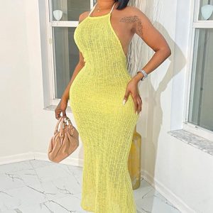 Questo sexy colore solido estivo delle donne basso indietro Tie Halter collo senza maniche Maxi Dress Design fatto di alta qualità Polyster e materiale Spandex. È elastico