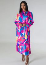 This Women's Tie Long Sleeve Printed Pleated Dress Design Made Of High Quality Polyster And Spandex Material. It Is Stretchy