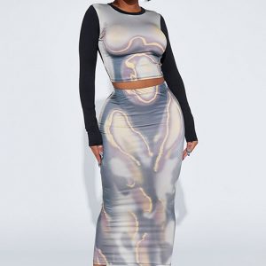 Cet ensemble de jupes maxi slim à col rond imprimé et décontracté pour femmes est fait de polyester et de spandex de haute qualité. Il est extensible