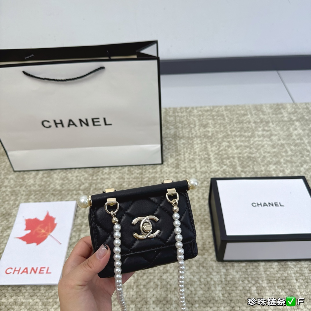 Chanel's top-notch little bag has enough functions and good looks to hold a small mirror