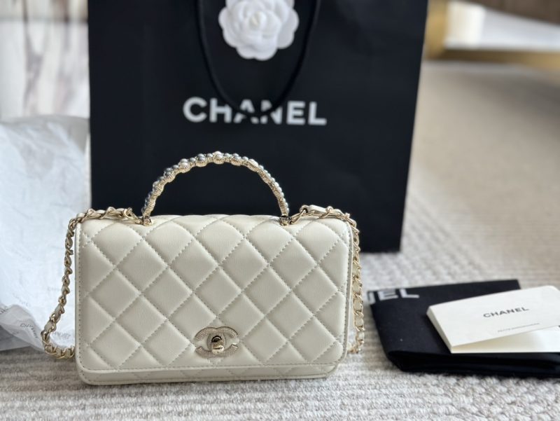 Chanel woc handbag material is cowhide