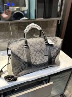 The same style travel bag at Coach counters